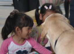 Girls and rescue dog