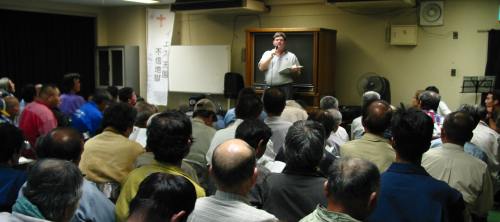 Dan giving a message at a Homeless Meeting