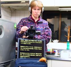 Karen with Camera and Notebook Computer